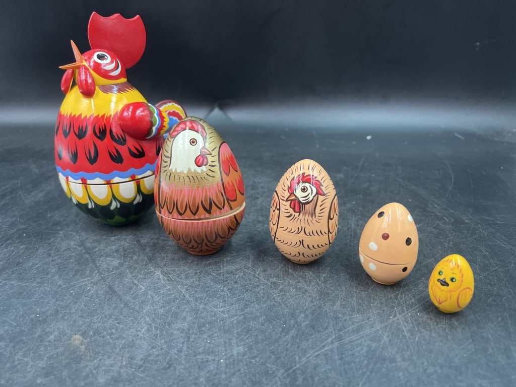 Russian Nesting Egg Set: Nice 5 piece set designed of a rooster, hen, a pullet, egg and small chick. Signed by artist. Hand painted and condition is good, see pictures. No refunds given.Condition Information: It is