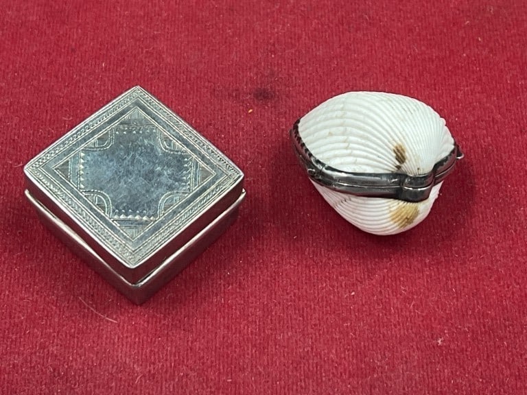 Sterling Trinket Boxes: Neat lot of 2 that are are neat square box and a clam shell. See pictures, condition is consistent with age and use. No refunds given.Condition Information: It is the responsibility of the