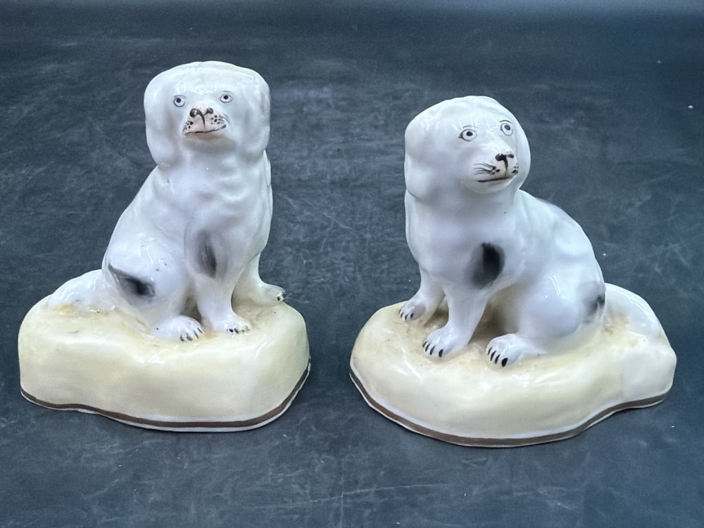 Vintage Staffordshire Dog Figurines: Pair of Spaniel Dogs. Measures 3" x 3 1/4" x 2". See pictures, condition is consistent with age and use. No refunds given.