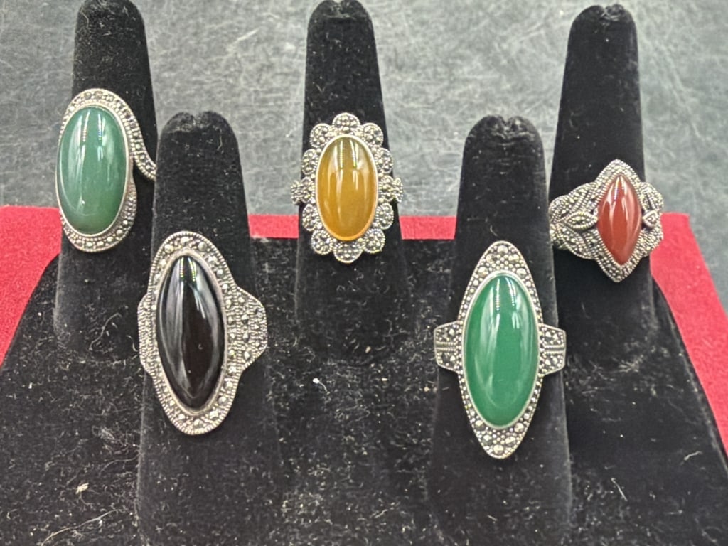 Sterling Rings: Total of 5 in this lot. The ring are size 8.5 to 9.5 and weighs 31.7g. Condition is good, see pictures. No refunds given.