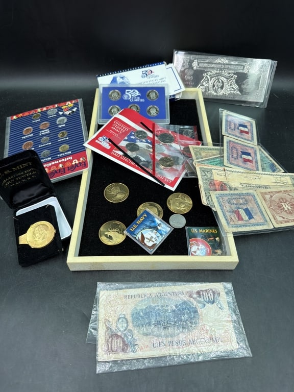 Foreign and US Money Lot: Mix lot that included Epcot International coins, 2004 proof set, more proof sets, Foreign bills, and more. See pictures. Condition is consistent with age and use. No refunds given.