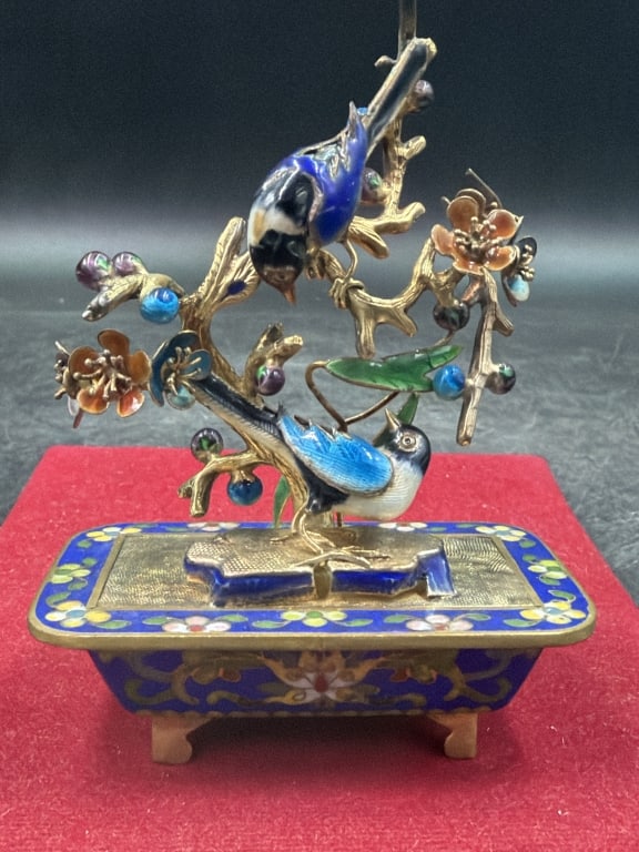 Miniature Cloisonne and Enamel Bird Bonsai Tree: Features 2 detailed gold guilted silver and enamel birds perched on a gold colored brand. They are set into a footed Cloisonne planter. Measures 4" x 3" x 1 1/4". Condition is good, see pictures. No r