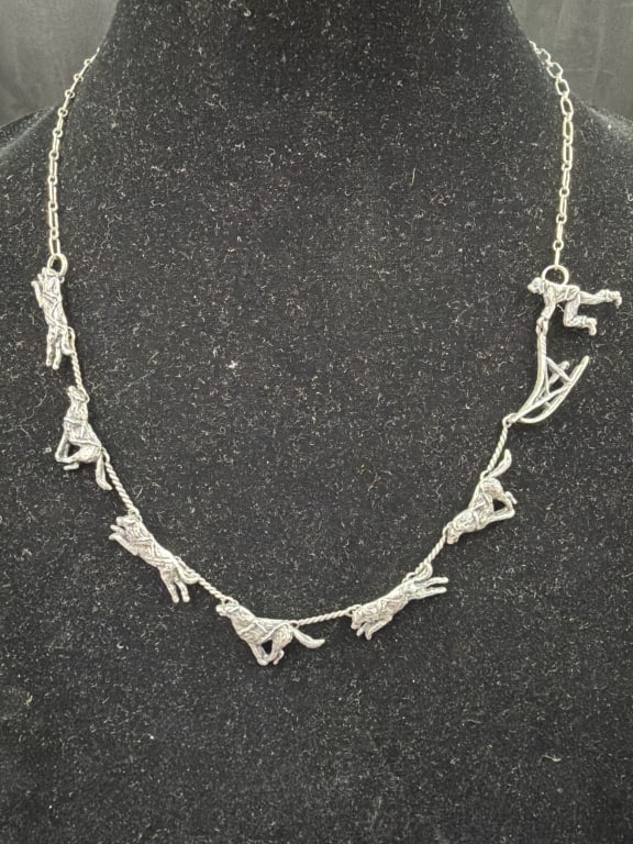 Sterling Necklace of Sled Dog Team with Musher.: Nice unique sterling piece that measures about 21". Weighs 25.0g. Condition is good, see pictures. No refunds given.