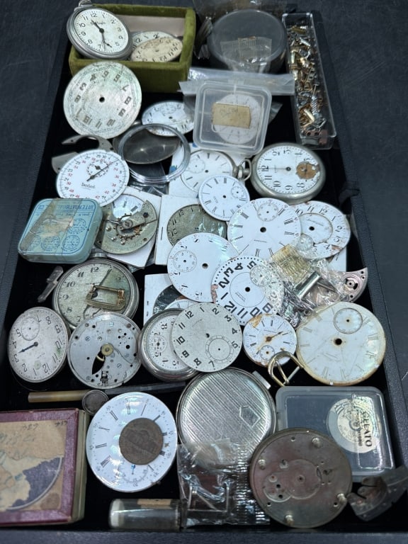 Watch Parts: Mix lot of watch parts. There is huge lot of dials, screws, etc. See pictures. No refunds given.