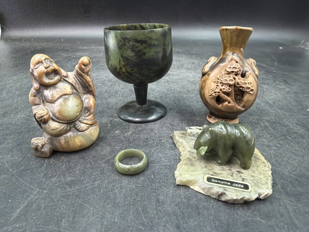 Vintage JAsian Lot: Total of 5 pieces. There is a jade ring, jade cup, Polar bear , Buddha and carved vase. See pictures. No refunds given.