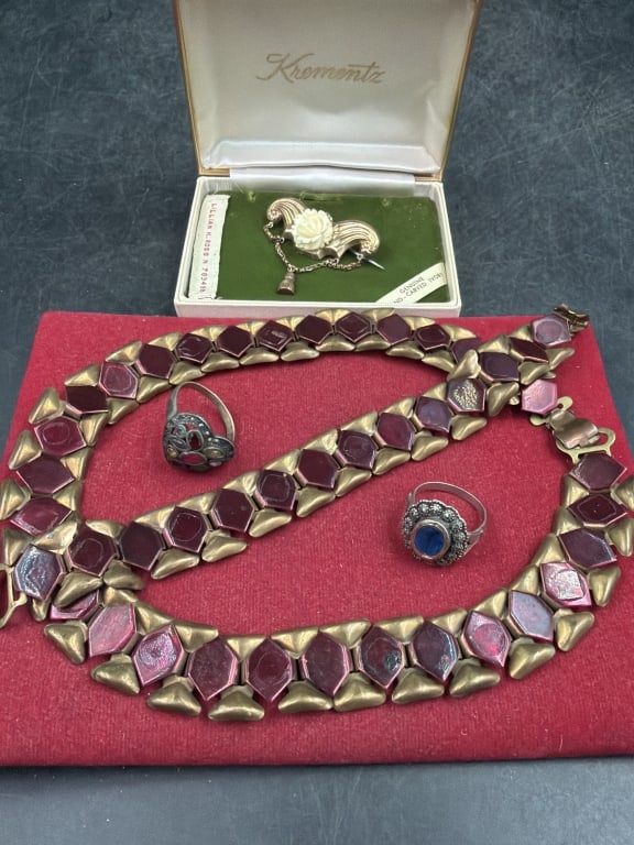 Mid Century Jewelry: In this lot is 2 silver rings, a brooch in original box and necklace w/bracelet. See pictures. Condition appears good. No refunds given.