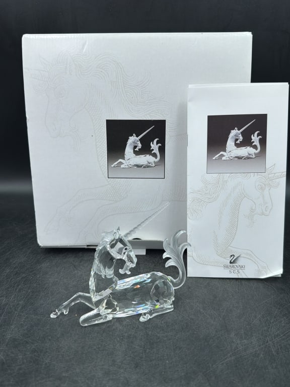 Swarvoski Unicorn with Box: 1996 Swarvoski Silver Crystal "Fabulous Creatures" annual edition unicorn. Clear crystal body with frosted mare, tail, horn and goat like beard. comes with original box and papers. Measures about