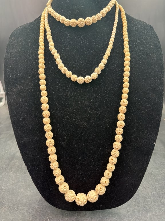 Vintage Art Nouveau or Mid Century Necklaces: Total of 3 in this lot. Intricately carved floral or rose shaped beads. Beads are gradual and they measures between 35" to 15". Condition is consistent with age and use, see pictures. No refunds
