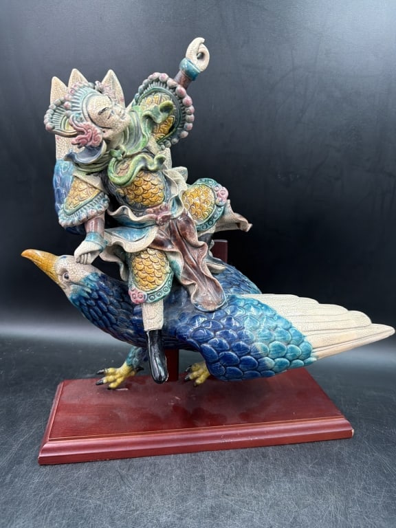 Antinque Chinese Clazed 'Roof Tile': Figure featuring a warrior riding a phoenix bird. Crafted from polychrome glazed pottery. Date back to late 19th or early 20th century. Historically used on temple roofs to ward off evil and attract g