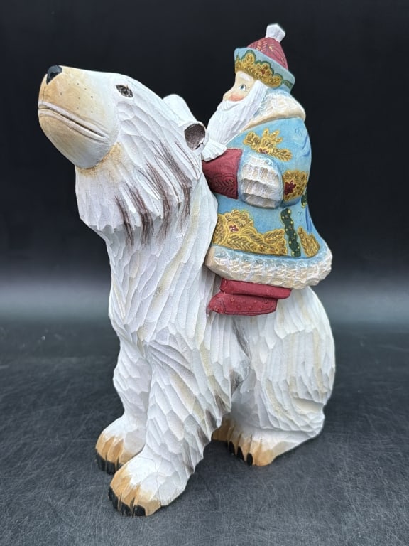 Vintage Russian Santa Claus: Part of the International Santa Claus Collection depicting "Grandfather Frost" from Russia. Santa Claus known as Ded Moroz or Grandfather Frost riding a polar bear. Made from linden wood. See