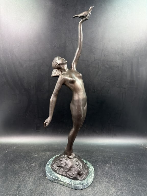 Bronze Sculpture 'Message of Love': Bronze art deco sculpture known as "Girl with Dove" or "Message of Love". Artist Pierre LeFaguaysn and signed. Stylized nude female figure in a graceful pose holding a dove. Measures 20.5". See