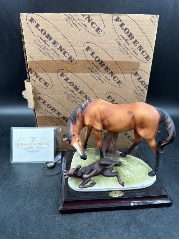 Florence Giuseppe Armani Horse Figurine: Crafter from a cold case porcelain/resin blend. Detailed depiction of a mare with her foal, mounted on a wooden base. Original box, packaging and COA. Condition is good, see pictures. No refunds
