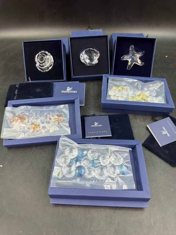 Swarvoski Lot: Total of 6 in this lot. All come with original boxes and papers. Nautical pieces, see pictures. Condition is consistent with age and use, no refunds given.