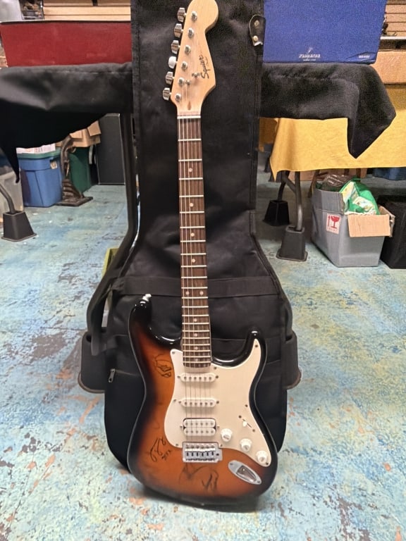 Signed Styx Squire Fender Guitar: Great piece of memorabilia to add to your collection. Signed by members of Styx band and condition is good. Comes with soft case. See pictures. No refunds given.