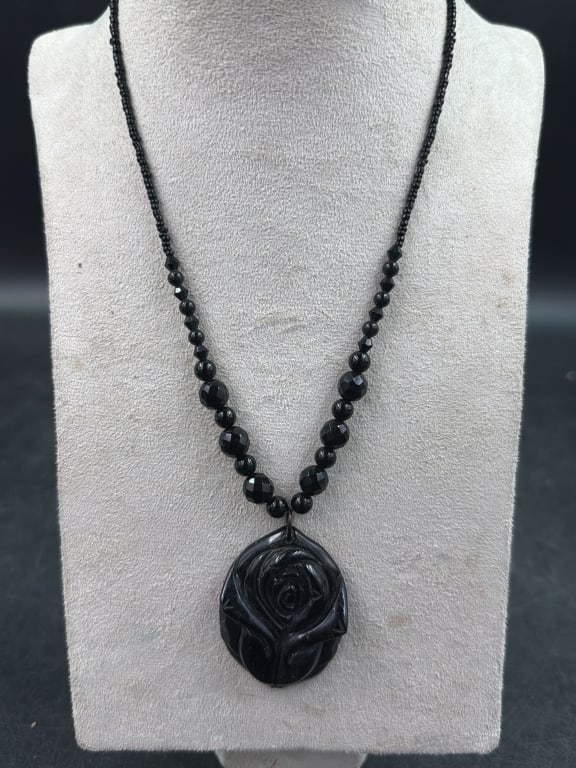 Vintage Onyx Necklace with Pendant: Nice older piece with gradual beads. There is a carved flower pendant 2" x 1 1/4". See pictures, this is in good condition. No refunds given.