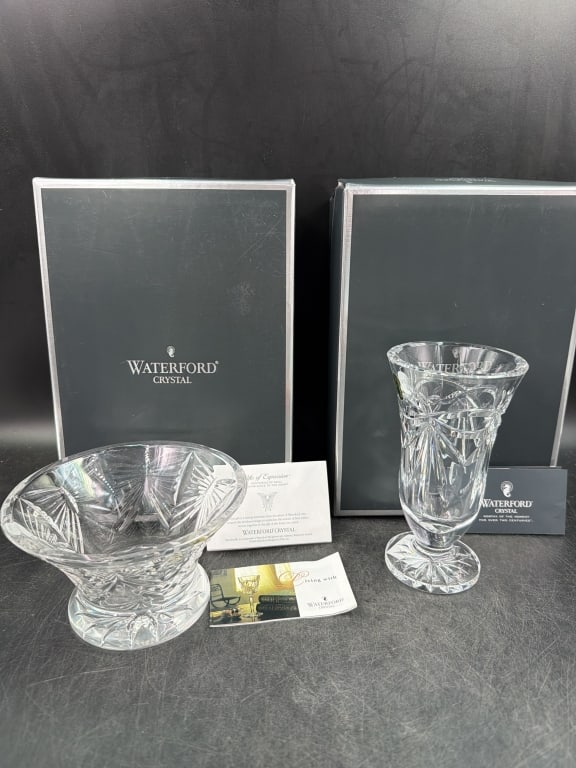 Waterford Glass: Both come with original boxes. One is a "Happy Anniversary" Collection features a distinctive heart and ribbon design cut in the crystal. Measures about 7". The other is a Best Wishes Crystal