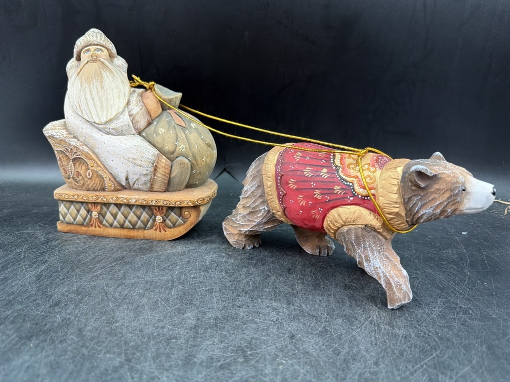 Vintage Russian Hand Carved Christmas: Hand carved and hand painted out of linden wood. Signed by artist Santa Claus pulled by polar bear. Measures Samta 8" x 6" and polar bear is 4" x 7.5". Condition is good, see pictures. No refunds