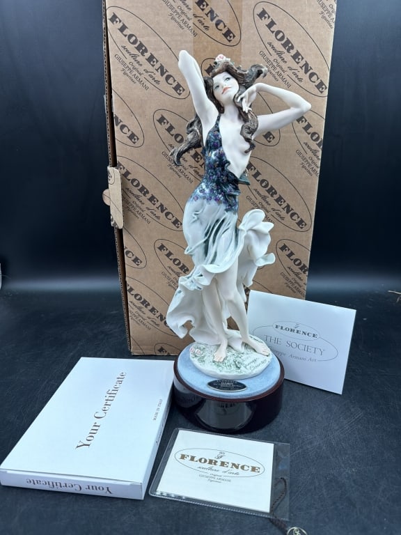 Florence Giuseppe Armani 'Dawn': The Coming of a New Millenium. Comes with original shipping box, papers and COA. LE #1157/5000. Measures about 14" and has mahogany base. Made of cold cast porcelain in matt and glossy finish.