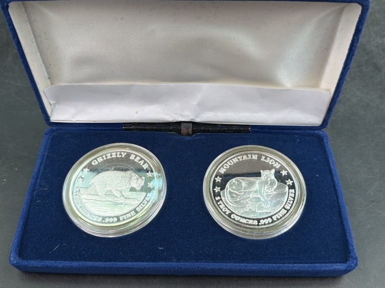 Commemorative 2 Troy Oz Coins in Set: North American Wildlife theme proof silver round set displayed inside a blue velvet presentation box. Condition is good, see pictures. No refunds given.