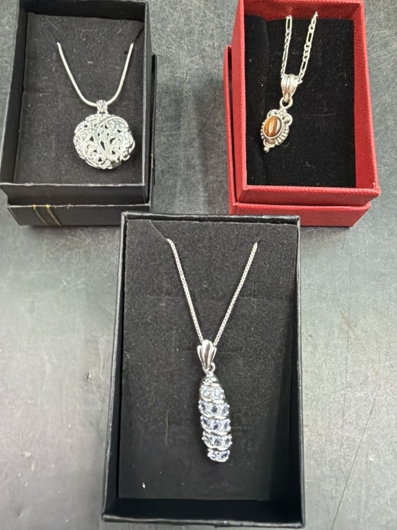 Sterling Jewelry Chains with Pendants: Total of 3 in this lot and all come with original gift box. They weigh a total of 19.2g and condition is good, see pictures. No refunds given.