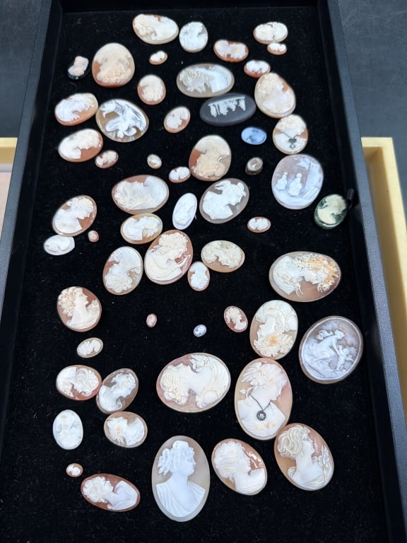 Vintage Cameo Lot: Huge lot of Cameos in different sizes, some have gold/diamonds as well. There is estimated 55 pieces in this lot. Condition is consistent with age and use, see pictures. No refunds given.