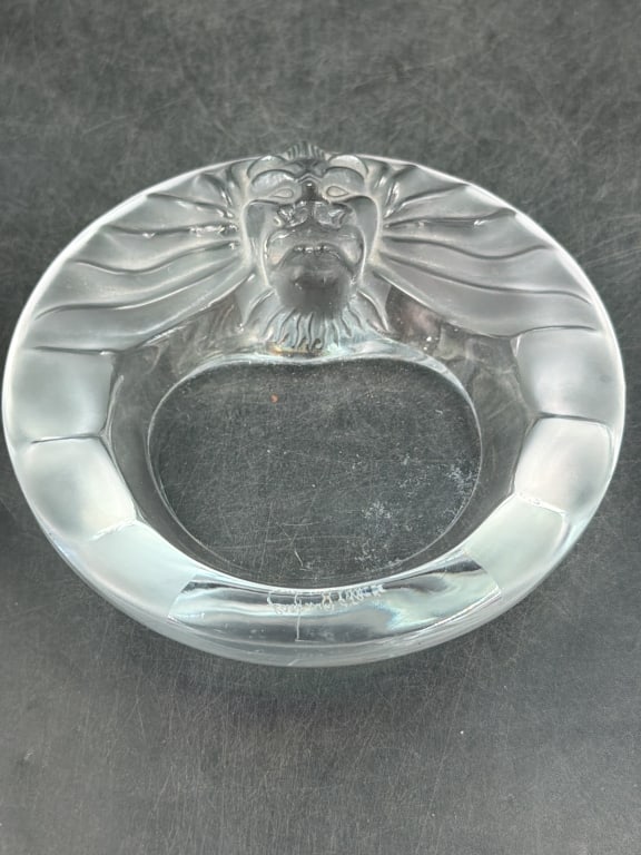 Laligue Crystal 'Tete de Lion' Ashtray: Measures 5.5 and 2" h. Produced in the mid 20th century. Featuring a frosted lions head bas relief design. Condition is good, see pictures. No refunds given.