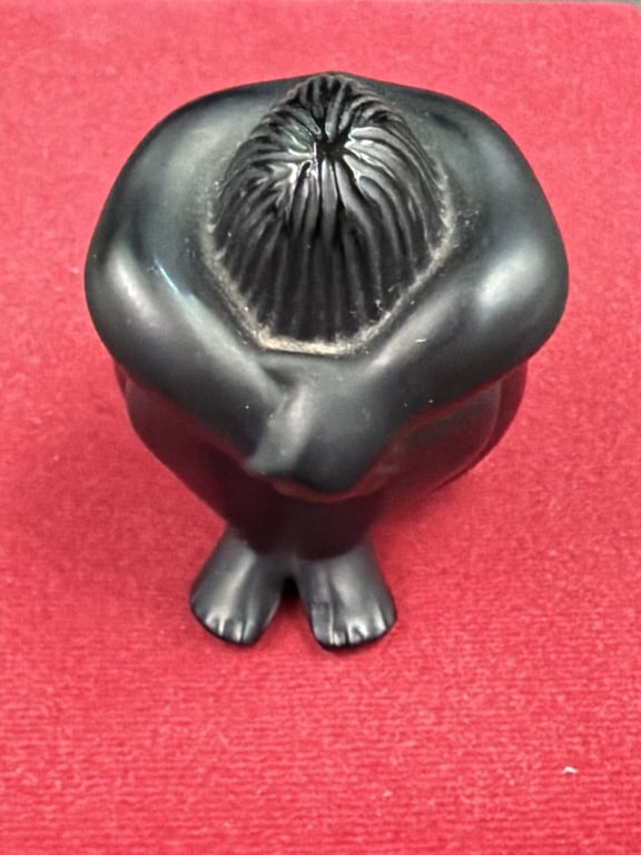 Lalique Black Crystal 'NU Assis' Figurine: Seated nude figurine that is solid frosted art glass crystal with smooth satin matte black finish. Stylized nude figure seated in a tightly tucked meditative position. Condition is good, see