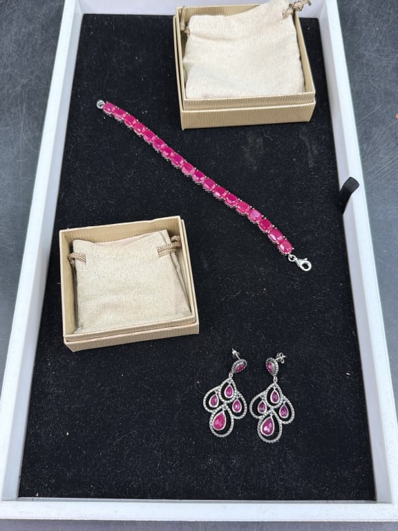 Sterling Bracelet with Earrings: Nice pink ruby oval cut gemstone tennis bracelet connected by links and finished with lobster claw. The earrings are chandelier dangle earrings with teardrop shaped gemstones. Total weight of all is 3