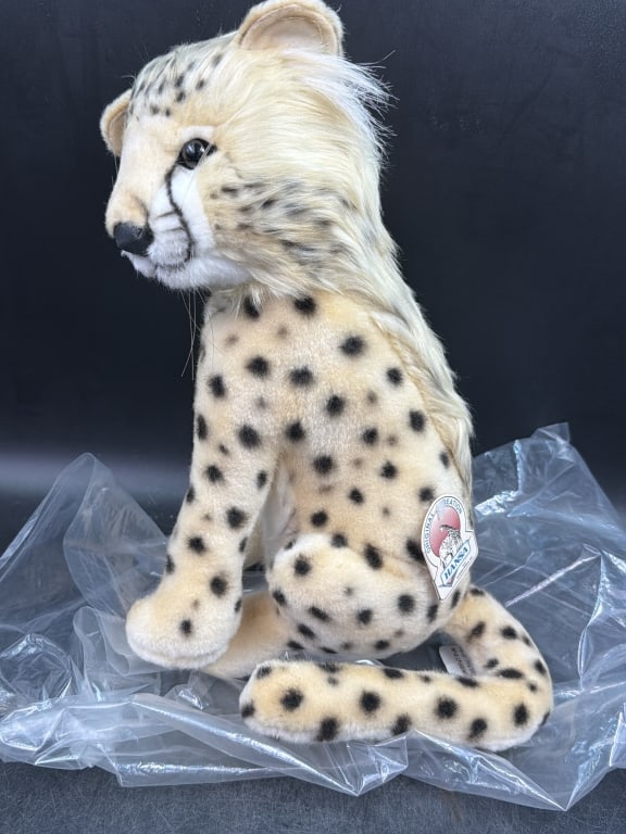 Hansa Toy International: Sitting Cheetah Club plush soft toy. Measures about 13" and condition appears good. Has original hang tag. See pictures, no refunds given.