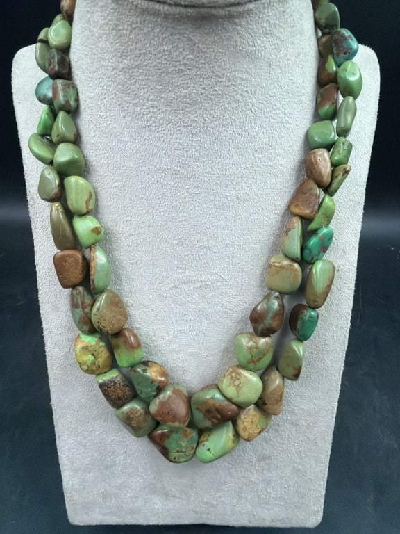 Chunky Green Turquoise Double Strand Necklace: Stunning piece that is marked on sterling clasp DTR (Desert Rose Trading). Necklace is a nugget necklace. Measures about 17" l. Genuine chunky green Mojave turquoise nugget showing natural shades of