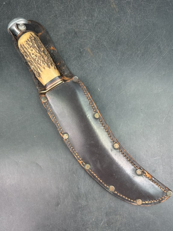 Original Buffalo Skinner Knife: Features stag handle with metal pommel. Has fitted leather sheath. Measures almost 13". See pictures, no refunds given.