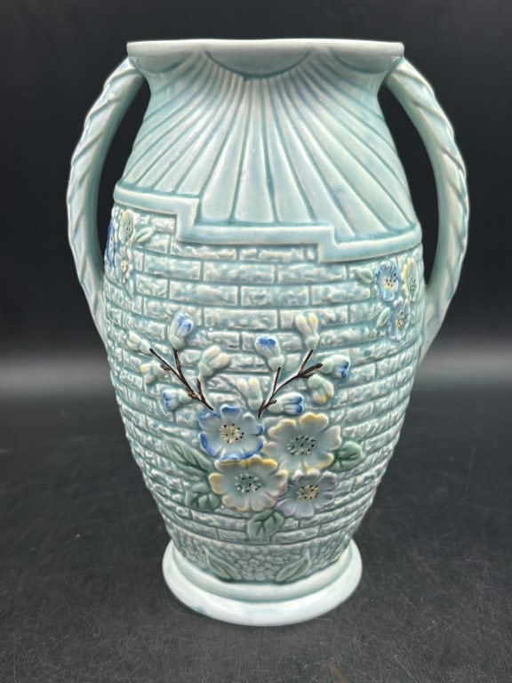 Vintage Arthur Wood and Son Pottery: Garden Wall pattern English pottery stamped on bottom. Embossed brickwork and floral decoration. Double handled design with blue pastel. Circa 1934-1945. Measures 9 3/4" x 5". Condition is good. No