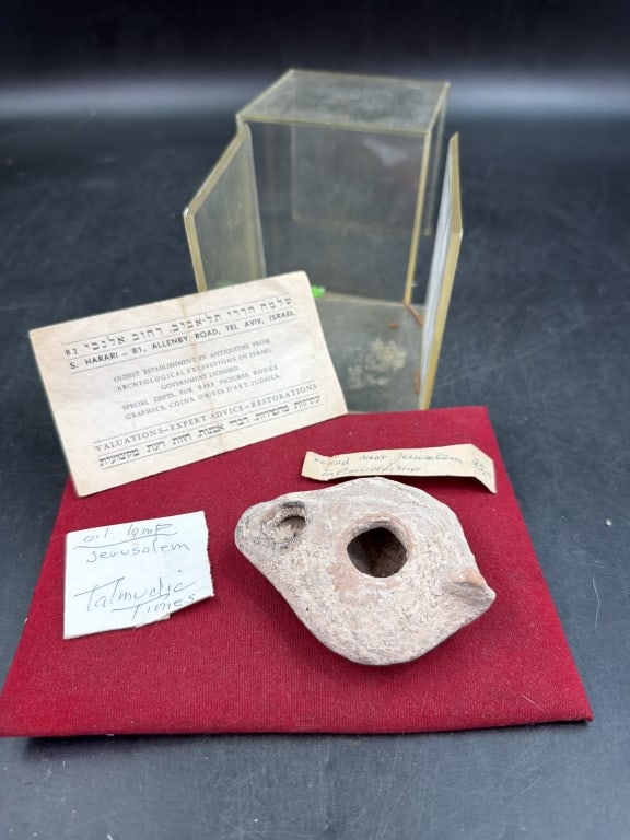 Antique Oil Lamp: Very early oil lamp. From Israel (Jerusalem) during the Talmudic times. See pictures for papers on this piece. Measures 3 1/4" x 2.5". No refunds given.