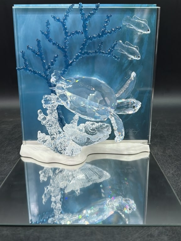 Swarvoski Wonder of the Sea w/Box: Comes with original box. 2006 Annual edition "Eternity" sculpture. Designed by Michael Stamey. Faceted crystal sea turtle swimming alongside two tropical fish near a coral reef backdrop. Colored