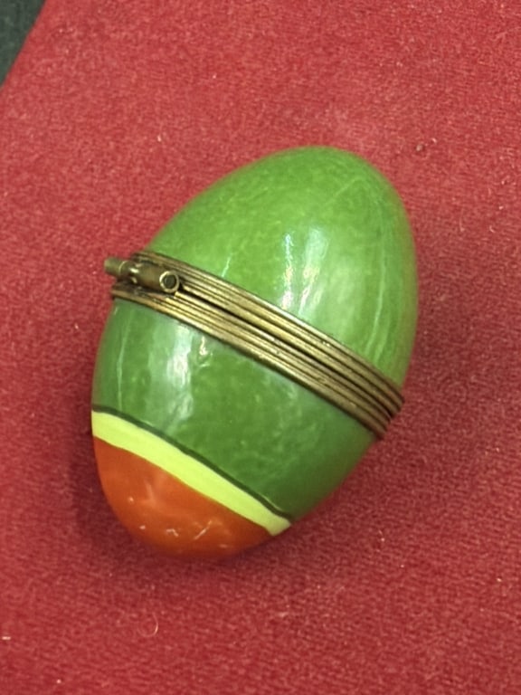Limoge Trinket Box: Hand painted fayence trinket box shaped as egg. Marked inside and condition is good. See pictures. No refunds given.