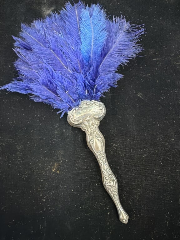 Antique Ostrich Feather Fan: Features a sterling handle. Circa 1920'. See pictures, condition appears good. No refunds given.