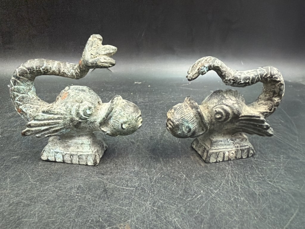 Bronze Figural Mounts: Figures depicts stylized marine creatures with distinct patina. Measures 3" x 4". Condition is consistent with age, see pictures. No refunds given.