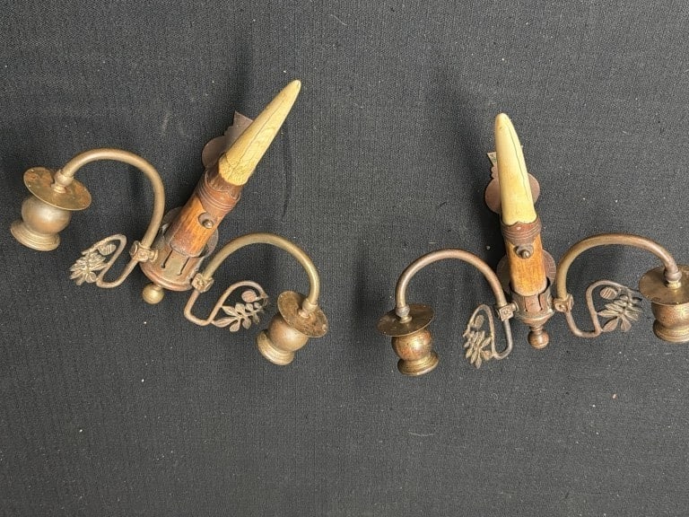 Antique Brass Double Arm Candle Sconces: Constructed from brass and condition is consistent with age and use, see pictures. Measures about 12" x 11", solid pieces. No refunds given.