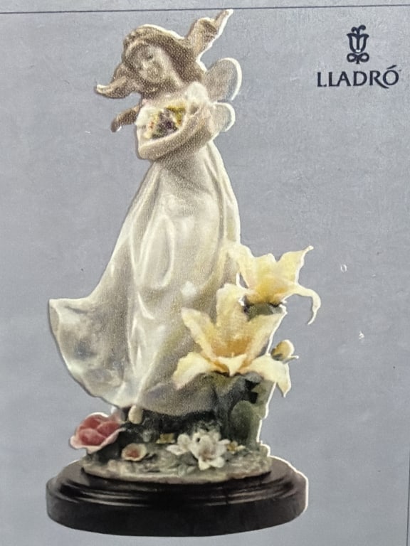 Llado "Mystical Garden" Figurine: Comes in original box, shipping box and base. Fairy holding flowers. LE of 5000 pieces. Condition is as follows appears to be slight chip on yellow flower. Not noticeable if not looking for it. See