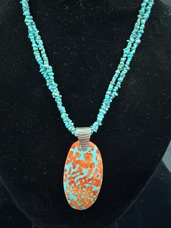 Turquoise Necklace with Large Oval Pendant: Pendant has inlay turquoise and spiny oyster with silver top (2 1/4" x 1 1/4"). . Necklace measures 21". See pictures, condition is good. No refunds given.