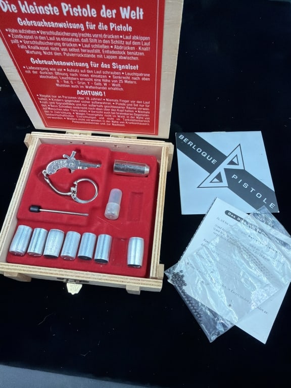 Berloque Miniature 2mm Pinfire Pistol: Manufactured in Austria and in wooden box. See pictures, no refunds given.