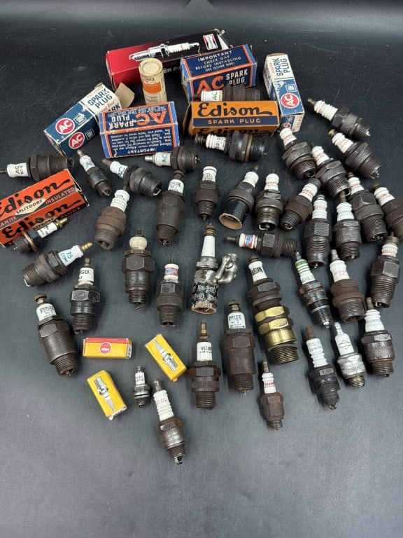 Vintage Spark Plugs: There is Edison, Champion, AC spark plug. Estimate 38 or more in this lot. See pictures. Condition is consistent with age, no refunds given.