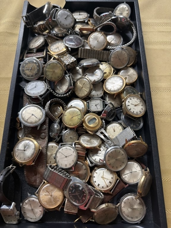 Vintage Watches: Huge lot of watches some with bands but majority do not. I believe majority are Timex, see pictures. Estimated over 50 pieces or more. Condition is consistent with age and use, see pictures. No