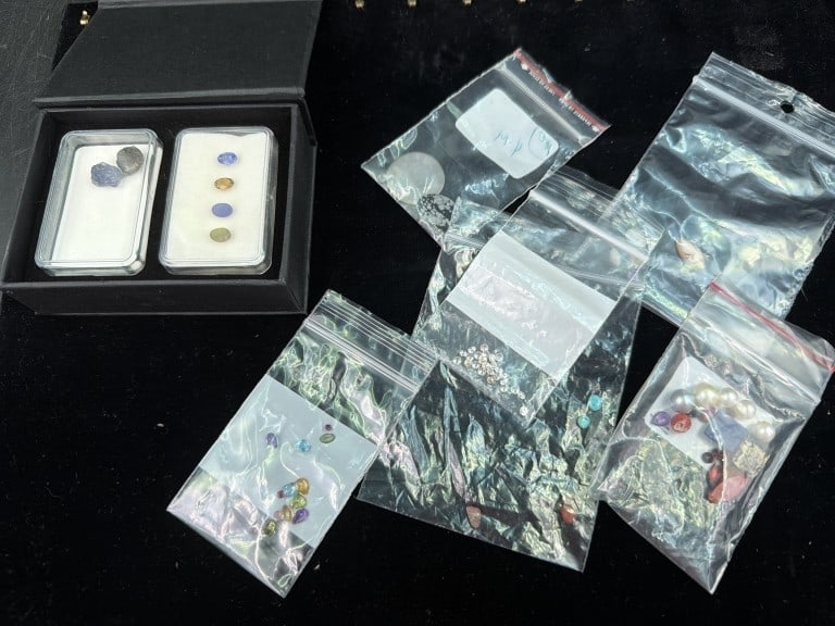 Gemstones: Big lot of a variety of nice gemstones. See pictures, such as white sapphires, coral, pearls, turquoise, rubies, amethyst, etc. No refunds given.