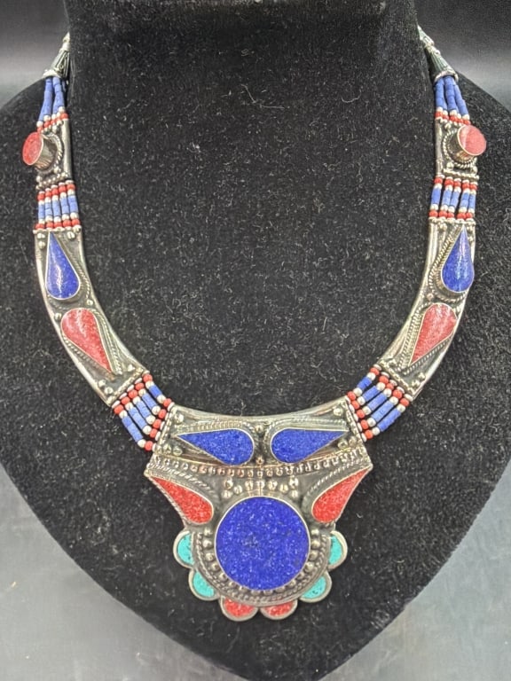 Vintage Tibetan Himalayn Silver Necklace: Features lapis lazuli and coral stones, also turquoise. Beaded chain links. Condition is good. Weighs 112.3g heavy piece. See pictures, no refunds given.