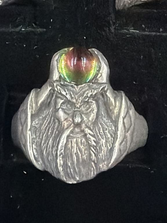 Vintage Silver Merlin Wizard Ring: Has detailed wizard face and multi colored crystal ball. Ring is a size 11.5 and weighs 11.1g. Condition appears good. No refunds given.