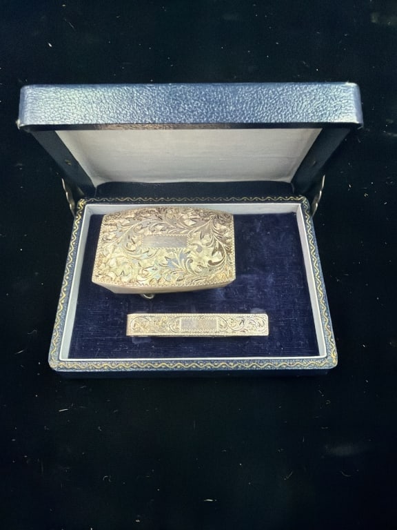 Vintage Silver Belt Buckle and Tie Clip: Weighs 28.6 grams. Belt buckle and tie clip in original box. Condition appears good. No refunds given.