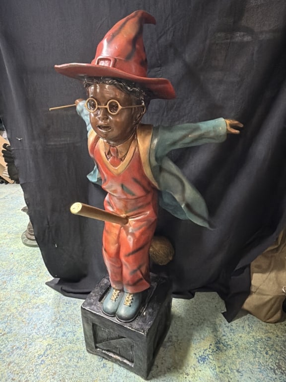 Bronze Little Wizard on Broom Statue: Measures about 49" and hand applied multi color patina and rounded glasses. See pictures, condition appears good. No refunds given.