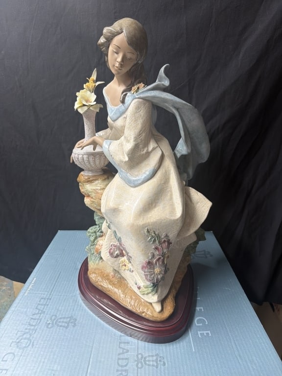 Lladro "Garden Breeze" Figurine: Part of the Privilege Collection limited edition of 1500 pieces. Measures about 23.5 inches tall with custom wood base. Has original box and signed on bottom. Condition appears good, see pictures. No