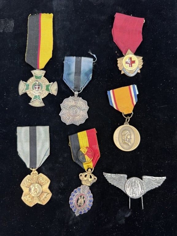 Vintage Medals: Total of 7 in this lot. There is (2) Belgian Order of Leopold II medal (circa 1900's), Soviet era Red Cross Donor Bade, French Firefighter Medal of Honor, Pro Aris et Focis medal (early 20th century),